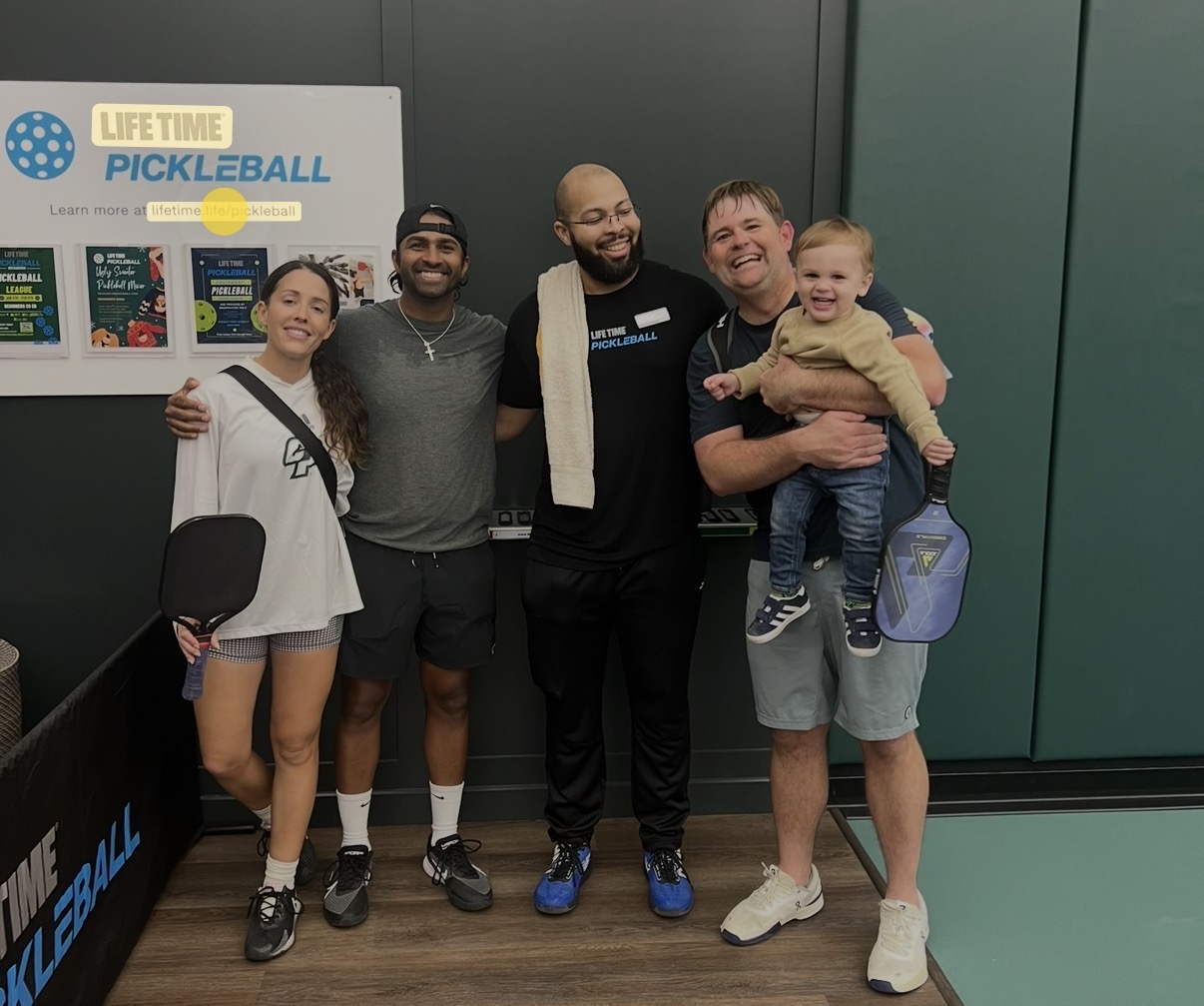 Brett with players and family at Life Time